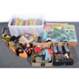 Collection of vintage toys and annuals.