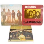 The Doors; three vinyl LP records, L.A.Woman, Waiting for the Sun and Morrison Hotel.