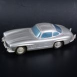 A Somerville wooden mock-up prototype of the no.105 Mercedes 300SL, painted silver with rubber