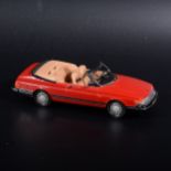 A Somerville wooden mock-up prototype of the no.130 Saab 9000 Cabriolet, painted red with rubber