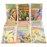 Twelve Siver-age DC comics, including Aquaman, Justice League America and Green Lantern.