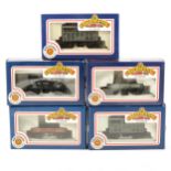 Sixteen Bachmann OO gauge model railway wagons; all boxed.