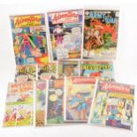 Twelve DC silver-age comics, including Adventure comics, Superboy, Mystery in Space and others.
