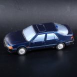 A Somerville wooden mock-up prototype of the no.132 Saab 9000 CS, painted metallic dark blue with