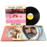 Frank Zappa; four vinyl LP records, Hot Rats, Sheik Yerbouti, Chuna's Revenge and Zappa Zoot