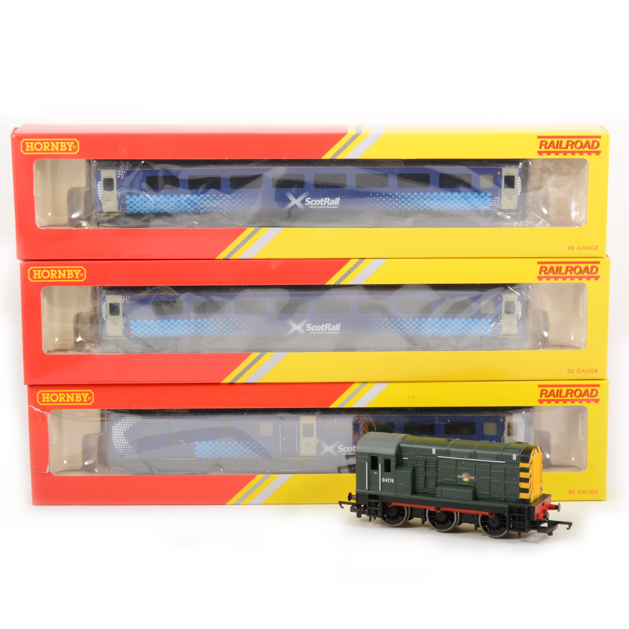 Hornby OO gauge model railway; three Intercity passenger coaches and a D4174 diesel shunter