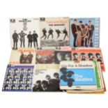 The Beatles and Rolling Stones; twenty two vinyl EP records, some with original sleeves.