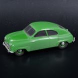 A Somerville wooden mock-up prototype of the no.119 Saab 92, painted green with rubber tyres, 9cm.