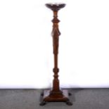 A reproduction hardwood urn stand, in the George III style, ...