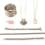 A collection of silver and white metal eastern jewellery.