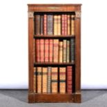 A reproduction Regency style mahogany finish open bookcase, ...