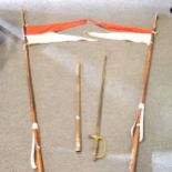 Reproduction American Civil War sword, and two spears.