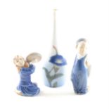 A Royal Copenhagen porcelain figure, of a girl playing cymbals, another figure and a vase.