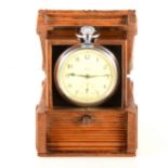 A Smith open face pocket watch in a wooden bedside travelling case.