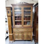 A Victorian bleached walnut bookcase secretaire, ...