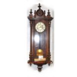 A walnut and beech Vienna wall clock,