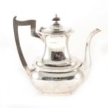 A silver coffee pot, by Walker & Hall, Sheffield 1931, ...