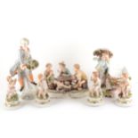 A Continental porcelain group, boys playing cards, ...