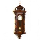 A walnut cased Vienna wall clock, ...