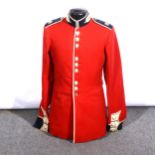 Scots Guards red tunic, with cap.