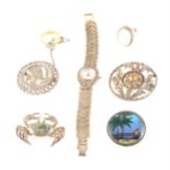A collection of silver and white metal jewellery, brooches, pendants, rings, collectables.