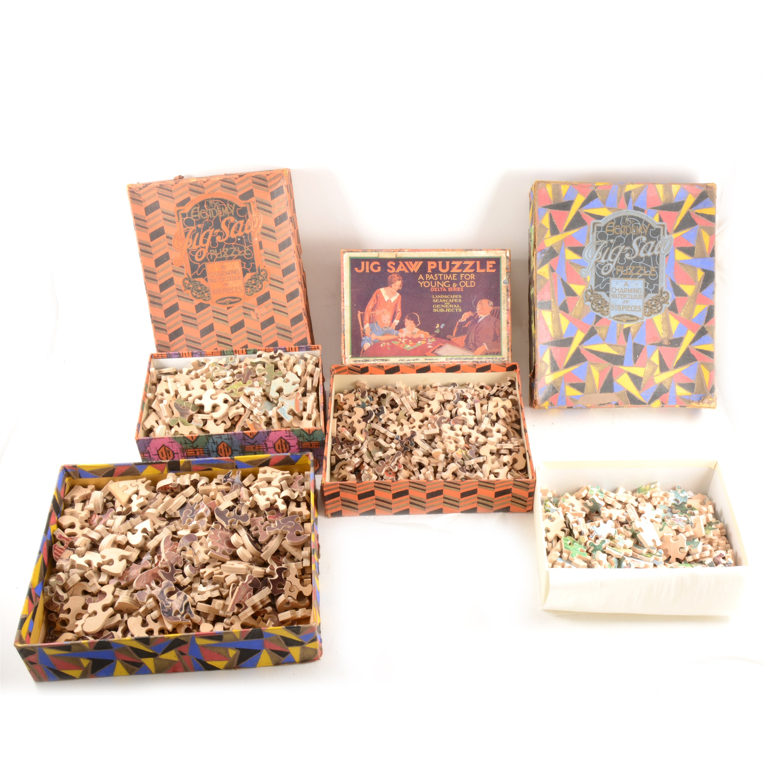 A quantity of Academy and other wooden jigsaw puzzles, boxed.