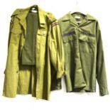 A camouflage combat smock and others.