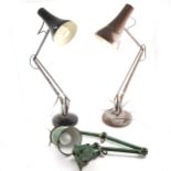 Wall/ worktop mounted green enamel industrial angle-poise lamp, and two others.