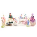 A small collection of Royal Doulton figures, ...