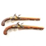 Pair of flintlock pistols by W Henshaw, London