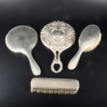 A matched set of silver backed engine turned mirror and two brushes, ...
