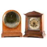 An oak cased mantel clock with brass dial, and another mahogany shelf clock.