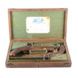 Pair of cased percussion pistols, by Henry Tatham,
