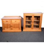 A modern Ercol elm bookcase, ...