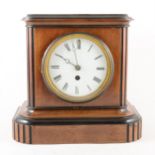 A walnut and ebonised mantel clock, ...