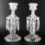 A pair of Baccarat glass candlesticks with ten prism lustres, marked on base.