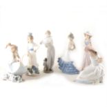 A Lladro figure of a girl, with telephone, ...