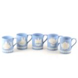 A collection of Wedgwood Blue Jasperware commemorative mugs, London landmarks, 12cm. (15)