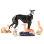 A Staffordshire pen stand, designed with a recumbent greyhound, ...
