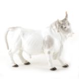 A large Meissen model of a Bull, damaged, ...