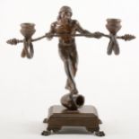 A bronze figural two-light candelabra,