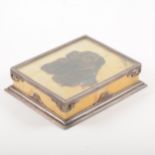 An Edwardian Sienna marble and white metal rectangular paperweight, signed Arthur Wardle.