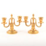 Pair of Louis XVI style gilt metal twio-branch candelabra