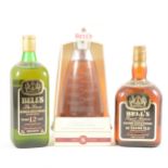 BELL'S - ROYAL RESERVE 20 YEARS OLD; 12 YEARS OLD; and a MILLENNIUM decanter