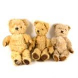 Three small mohair teddy bears, including a musical bear, c1930s-1950s