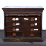 A walnut and stained wood Auberg filing cabinet,