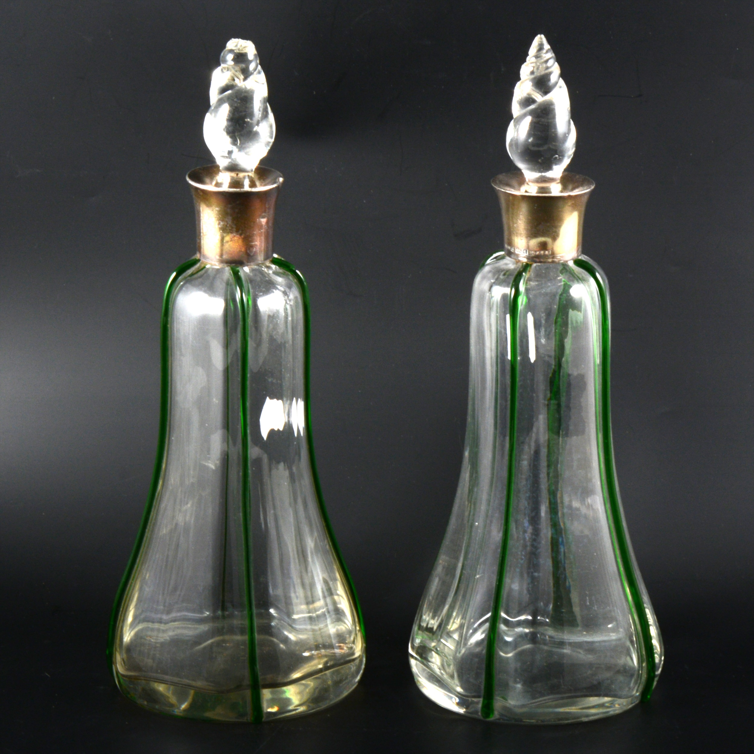 A pair of silver mounted decanters, John Grinsell & Sons, Birmingham 1903