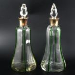 A pair of silver mounted decanters, John Grinsell & Sons, Birmingham 1903