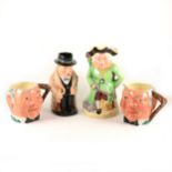 A Royal Doulton Toby jug, Winston Churchill, and three other character jugs.