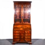 A George III style mahogany bureau bookcase, ..